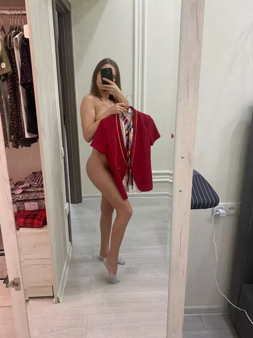 Time to get dressed for work. Pantyhose, skirt, blouse, jacket, scarf and high heels.