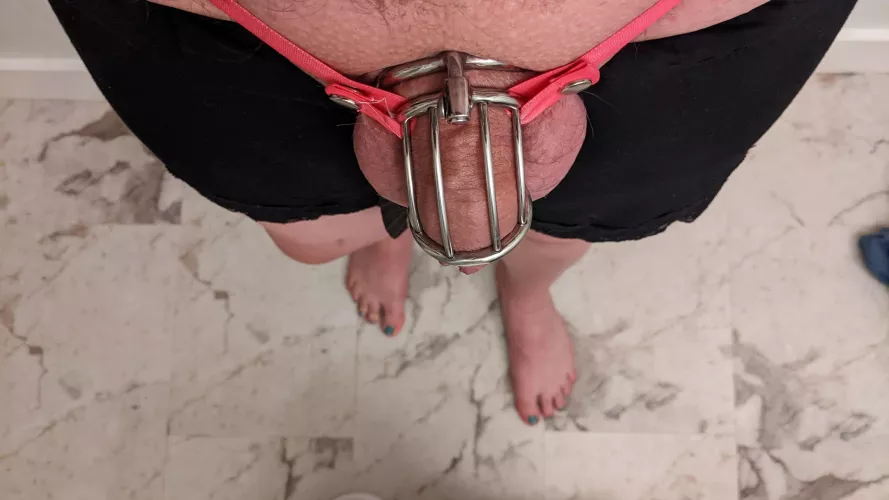 toes all pretty and painted, clitty filled cage and oh so horny 😈🍆💦🤤😍😈