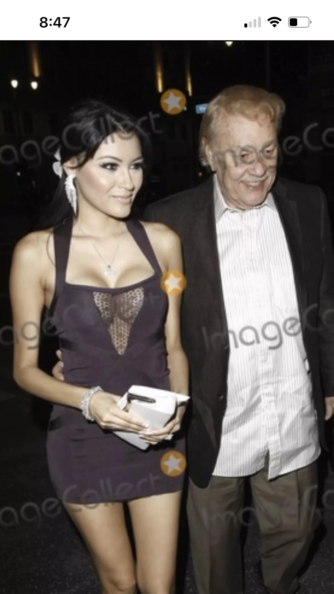 Who is this gorgeous model always with late Jerry Buss?