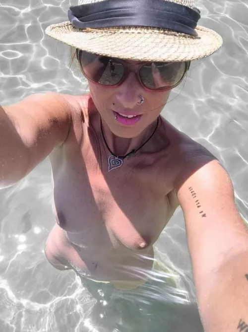 wife at the beach back in summer