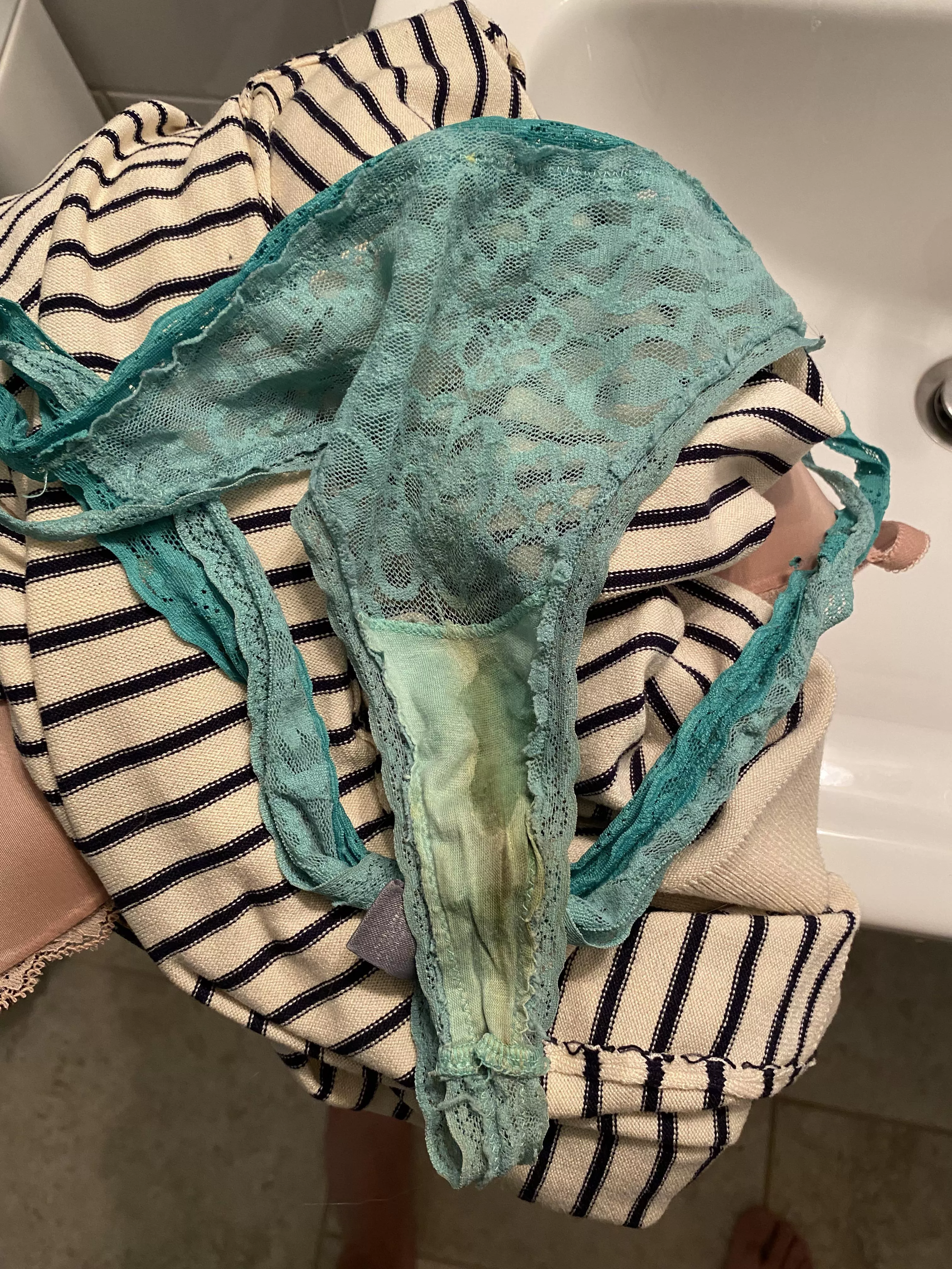 Wife’s friend’s incredible thong - still wet and fresh off her cunt 🤤