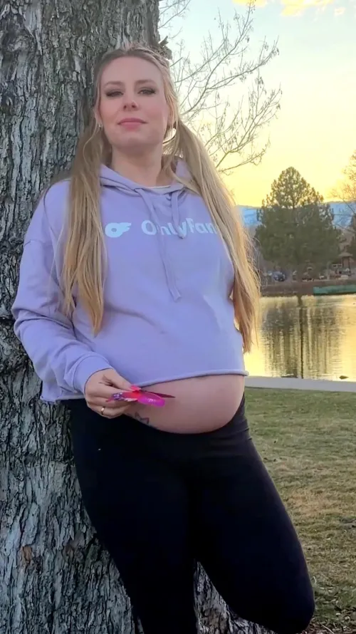 32 weeks and loving my OF hoodie over my belly