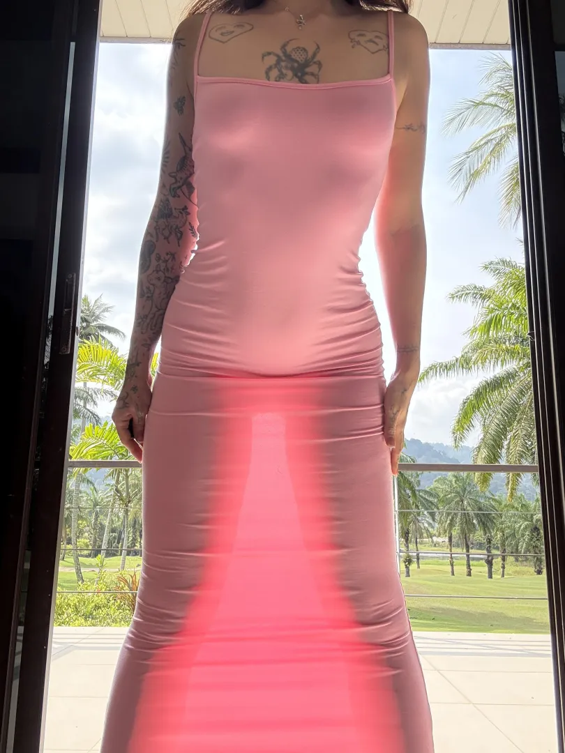 A light summer dress catches the sun's rays