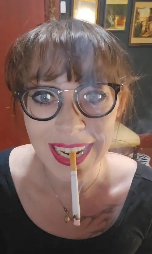 A pretty fuchsia colored lipstick to best dangle. I couldn't help but smile as I smoke