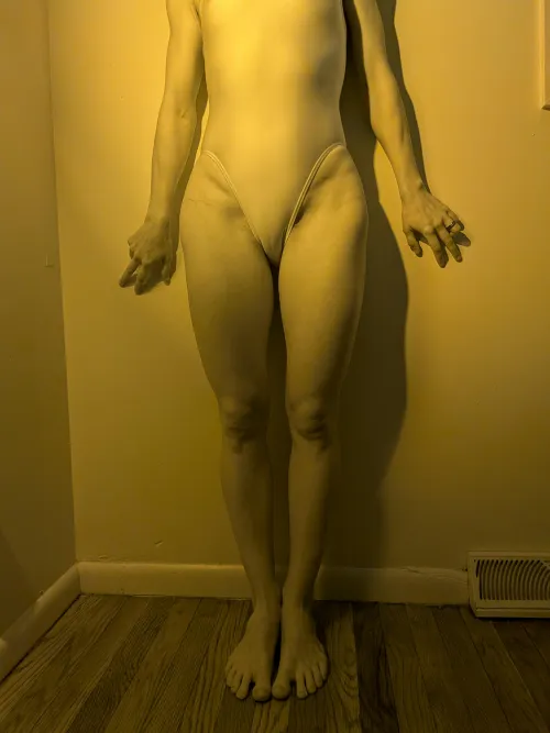 A white swimsuit as the color of the light it reflects