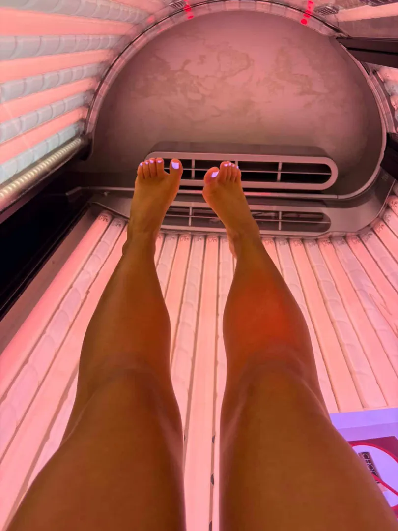 admire my feet while i’m tanning