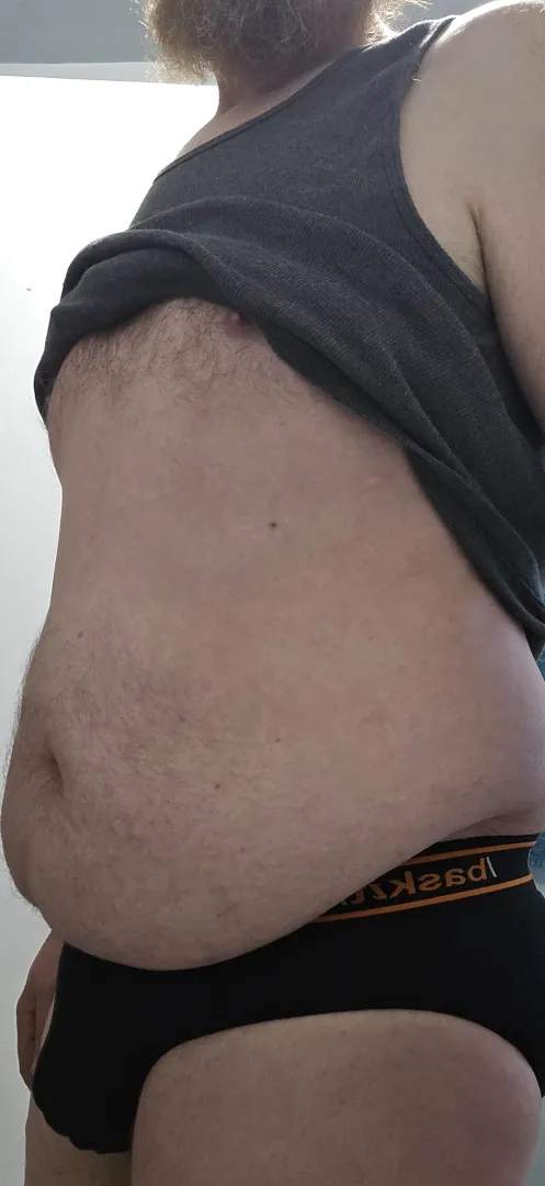 Age, 40. Getting ready for work.