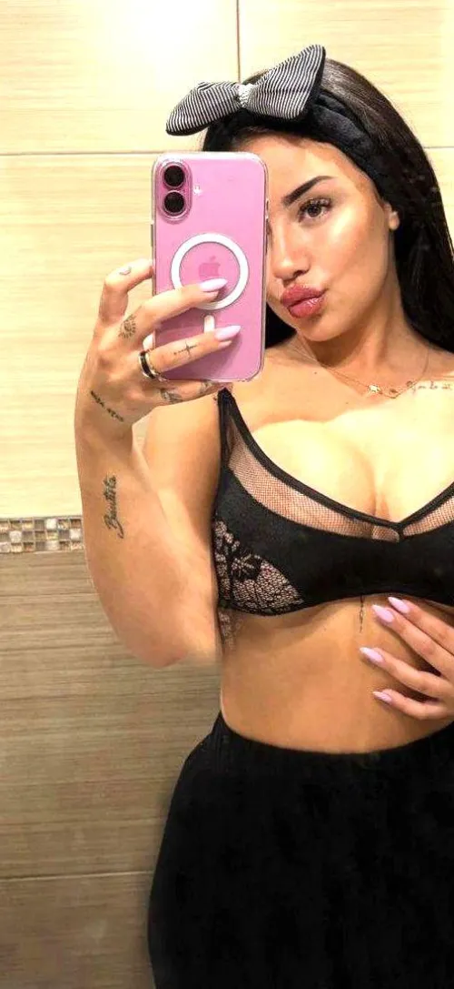 all black with a pop of pink