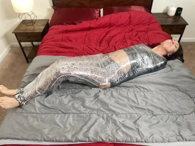 aria is mummified in saran wrap!