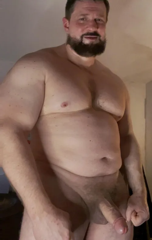 Blue Collar worker out of his sweaty clothes .