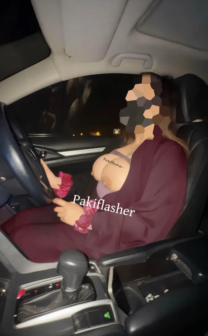 Boobs out while driving in abaya in 