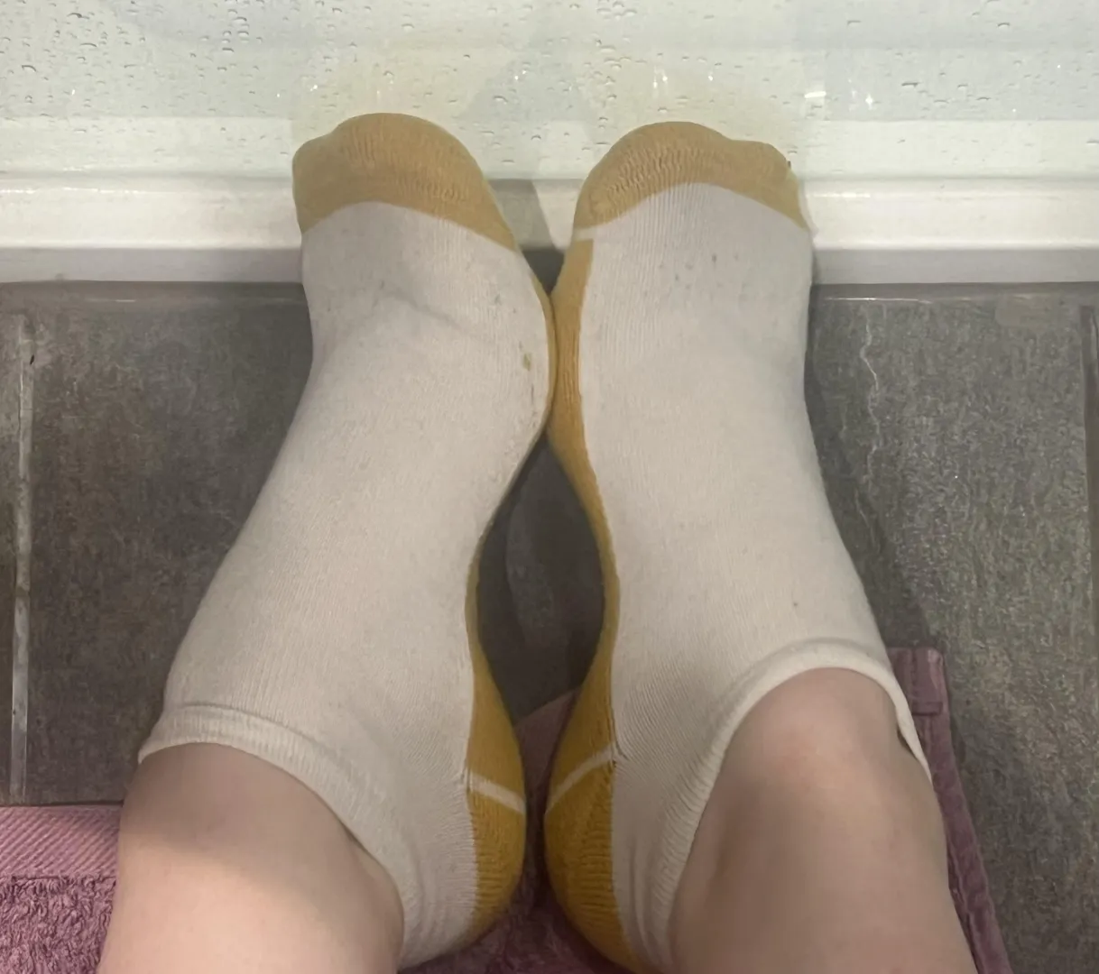 Can someone help me take my gym socks off please? 