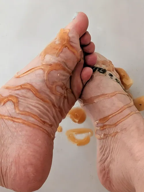 Close up. Honey drizzled on my pretty feet. Sweet and sticky. Who wants to lick 