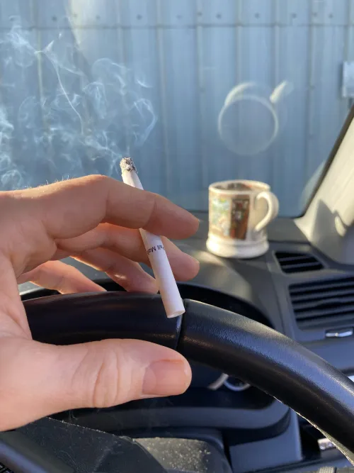 Coffee break in the car with the daily smokes