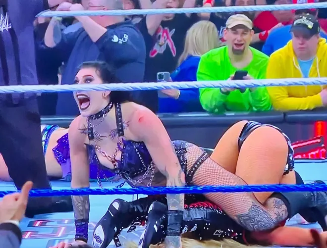 Could Liv possibly be the one to receive the most humiliating pinfalls in history? Once again, bent over by Rhea like her toy