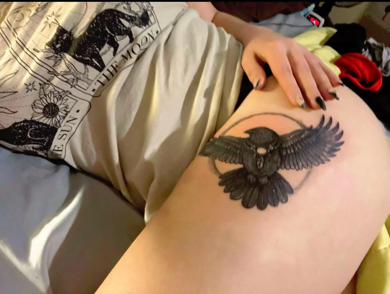 Covered up in bed… but this raven’s peeking out anyway