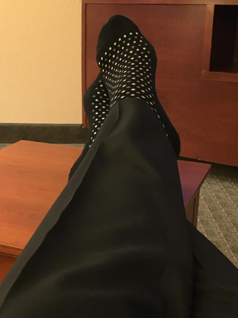 Dad (47) relaxing after a long work day. Who is going to rub them and take off my socks for me?