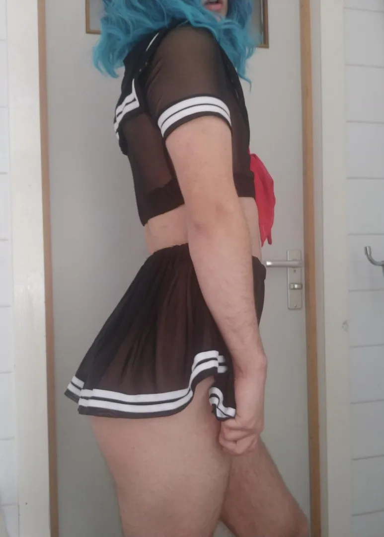 Dressed up like a pretty doll, this boy is becoming a girl