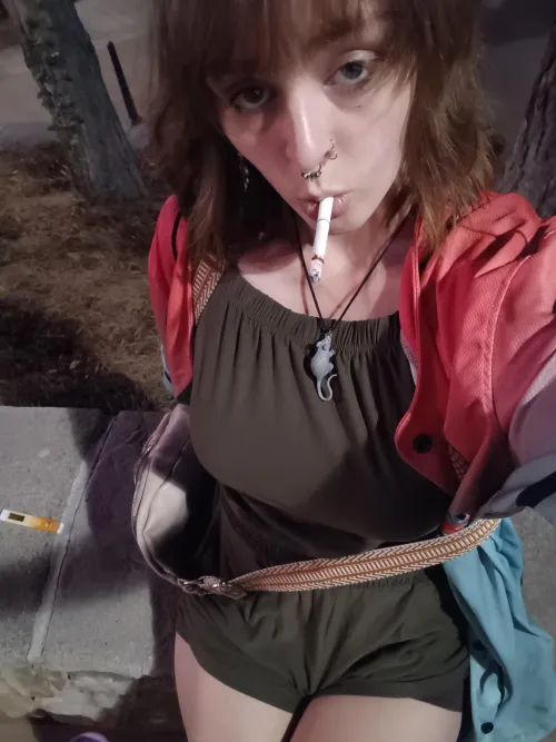 Drunk and smoking in a short dress