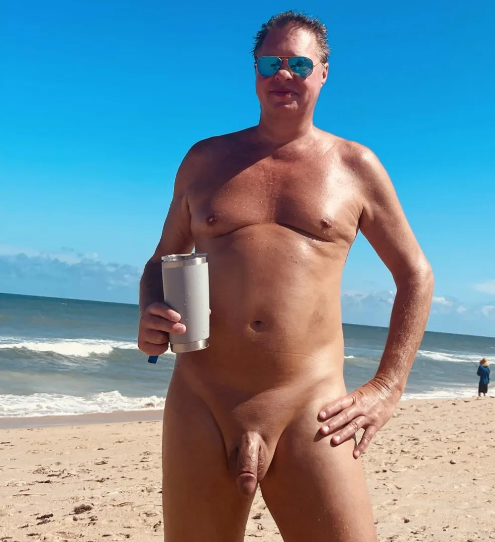 Enjoying a little rum on the beach