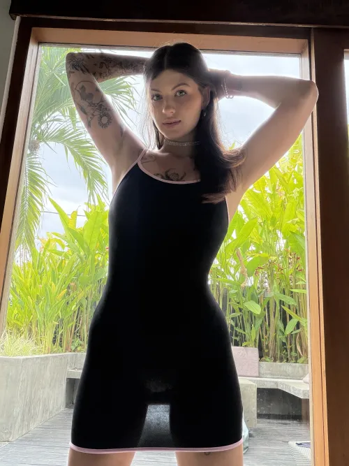 Even a black dress cannot block out the bright sunlight