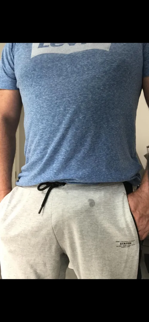 Excited in track pants