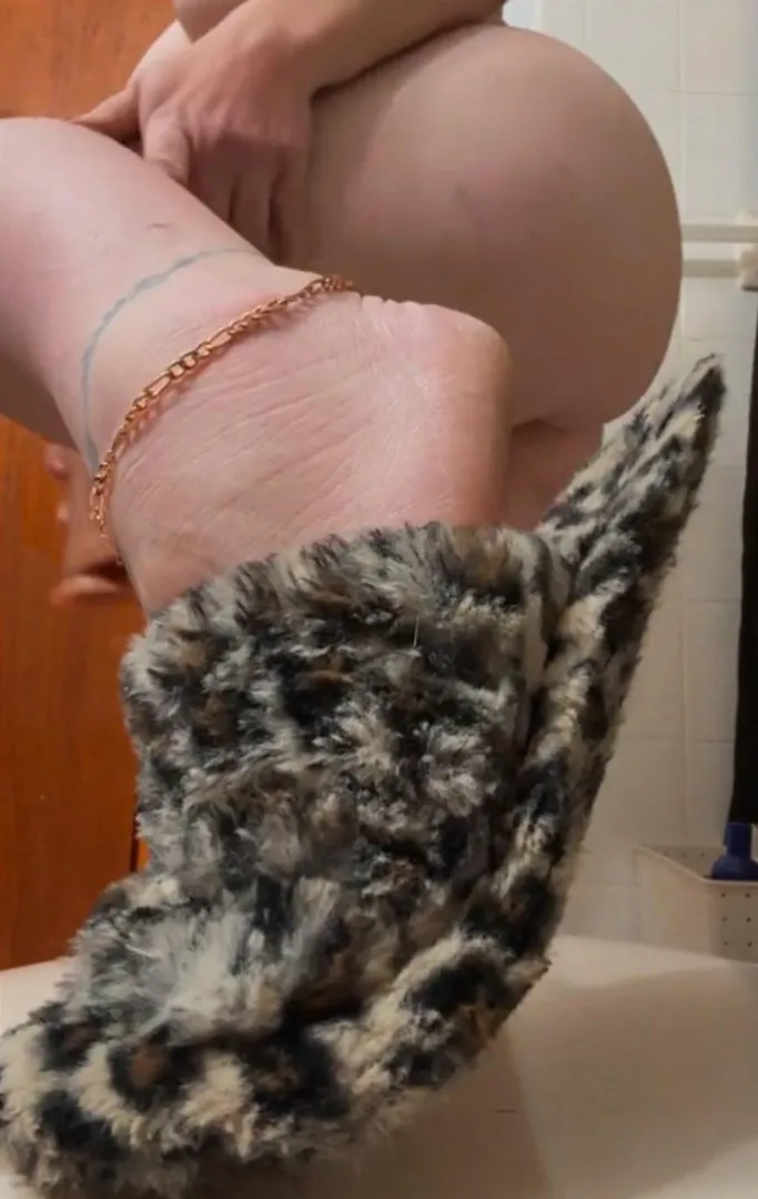 Feeling comfy in slippers and not much else 