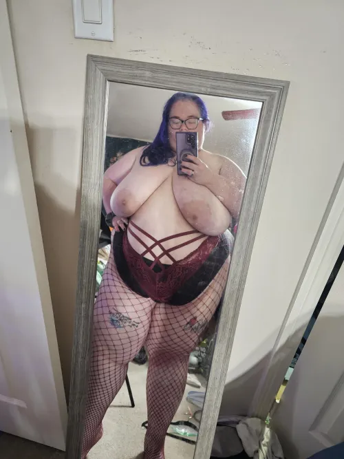 Fishnets on thick thighs