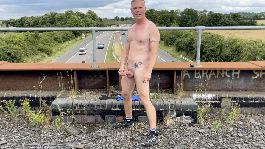 Forced to wank and cum on a Motorway Bridge.