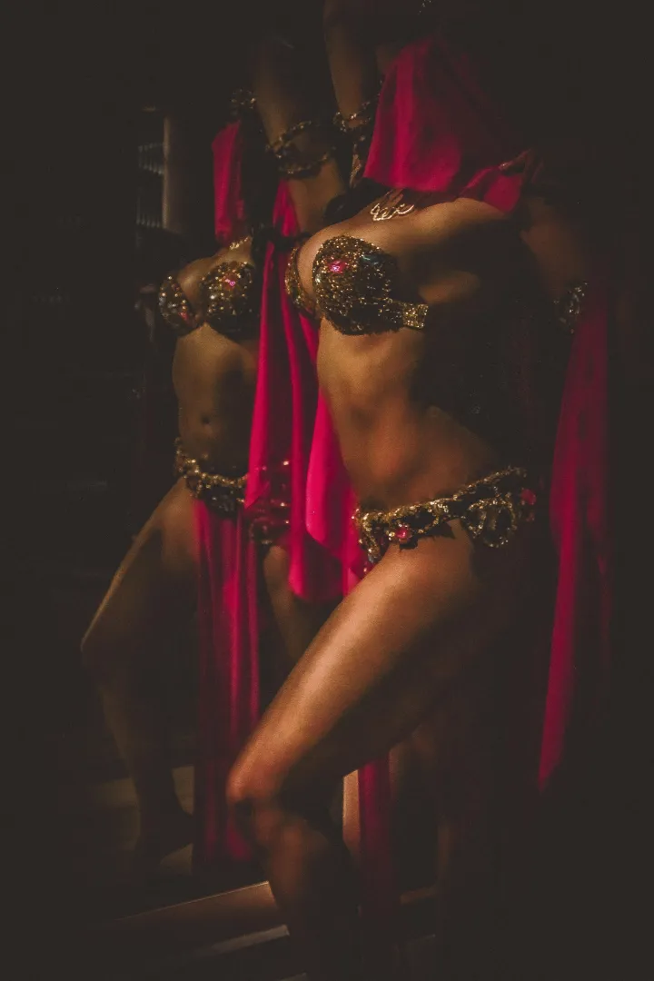 Gold accents and sculpted lines echo a modern Egyptian-inspired beauty.