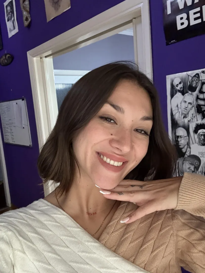 grinning at my phone like I just got good news