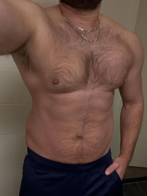 Hairy chest and a trail leading to a gift