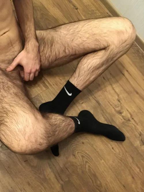 Hairy legs and black socks