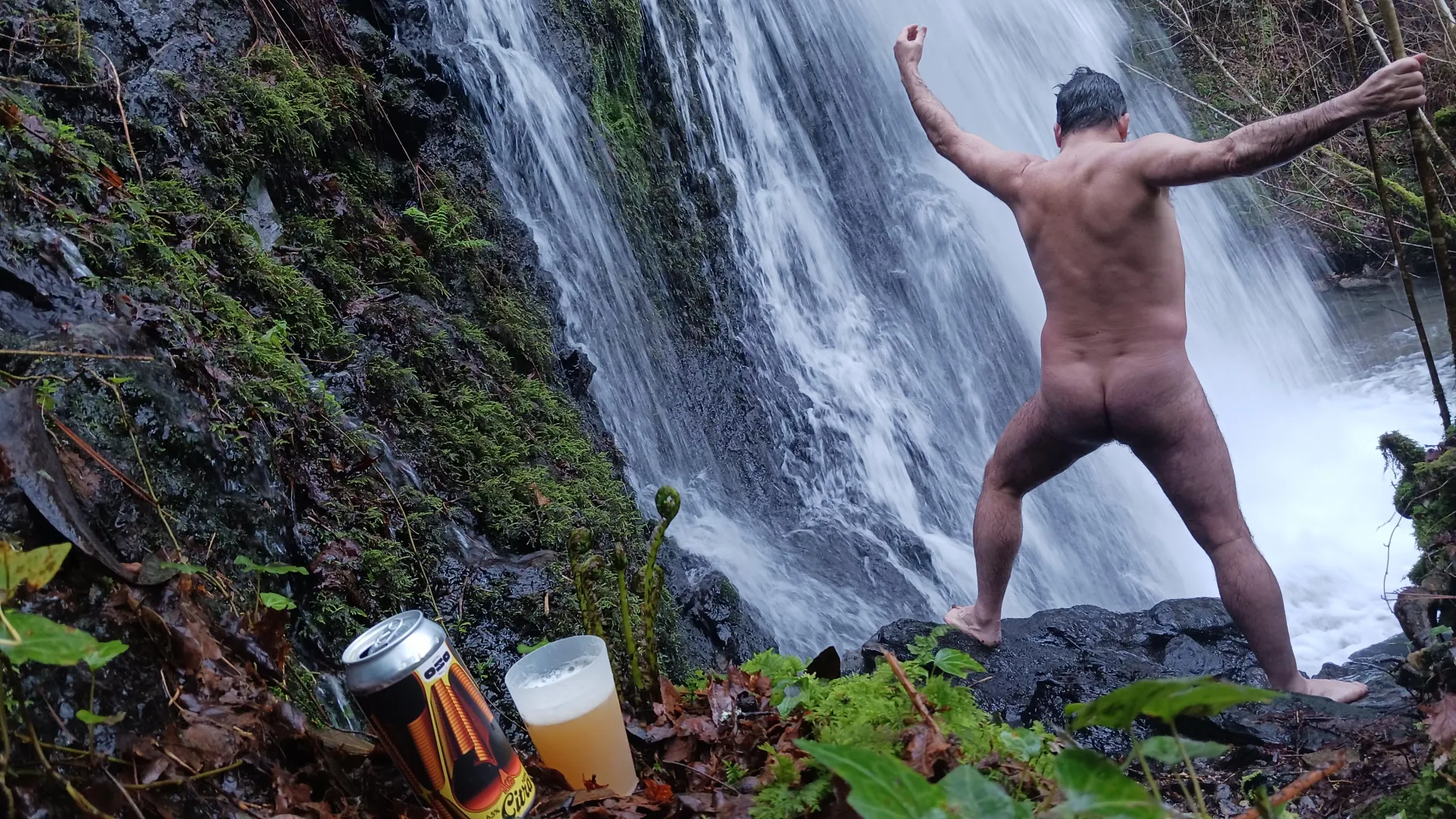 In the waterfall... beer & nudist time