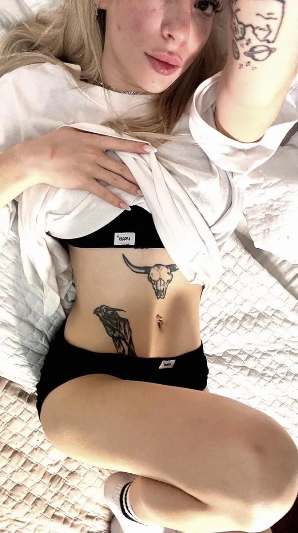 Just a blonde girl who leans in instead of speaking louder.