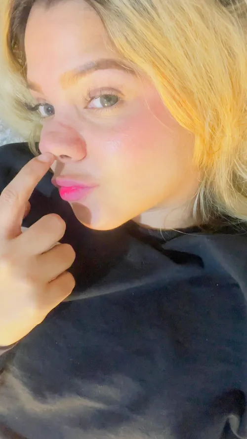 Just a blonde showing off her favorite features.