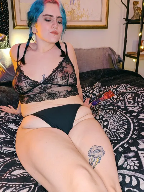 Just hanging out on the bed with my favorite toy 