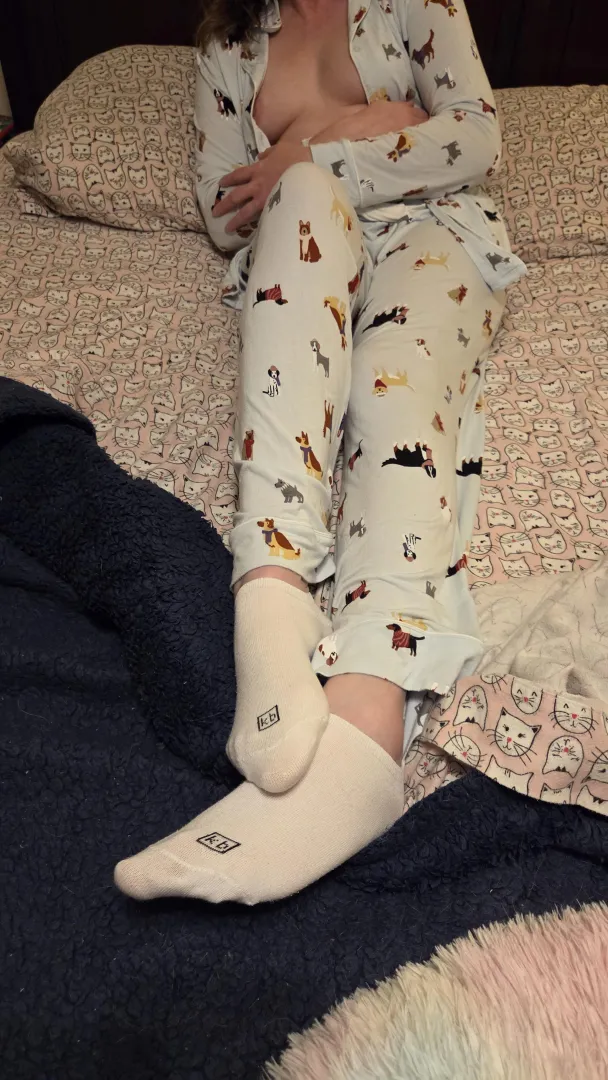 Just relaxing in my pajamas and white kb socks waiting for your cum. Click on the photo to enlarge a surprise