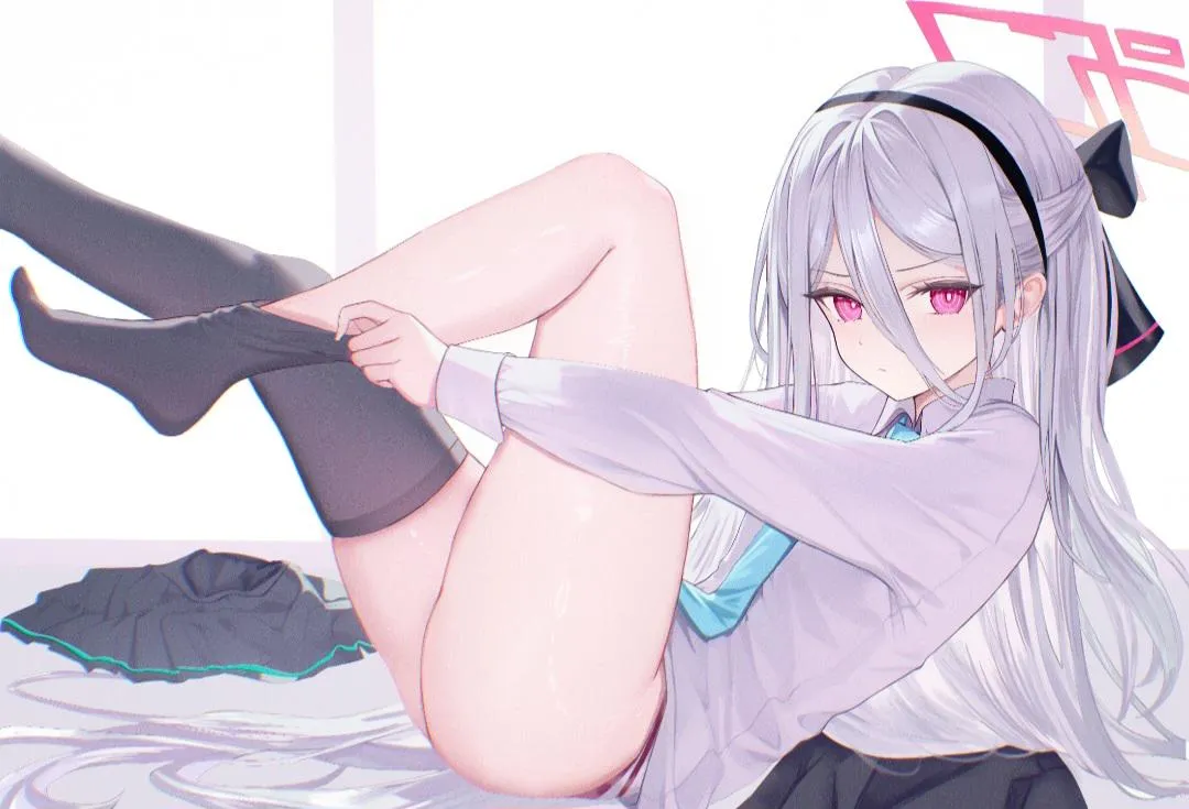 Kei putting on stockings