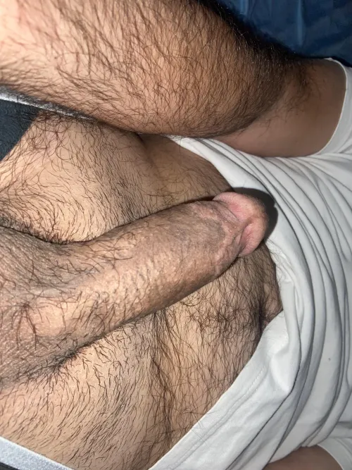 Laying on bed horny…