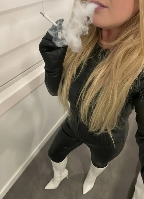 Leather fetish first.
Smoke second.
Both unapologetic.