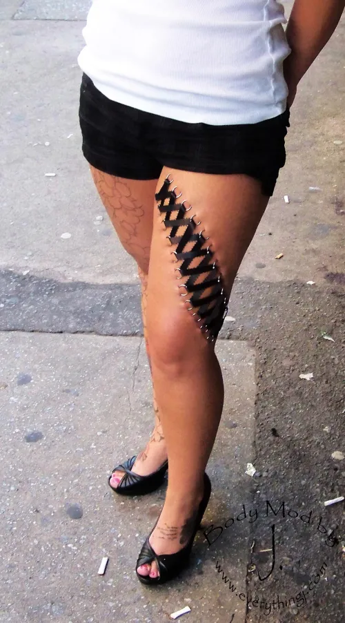Leg corset piercing