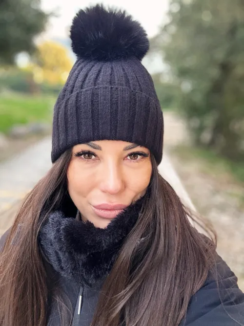 Looking hot even wearing a hat and a coat