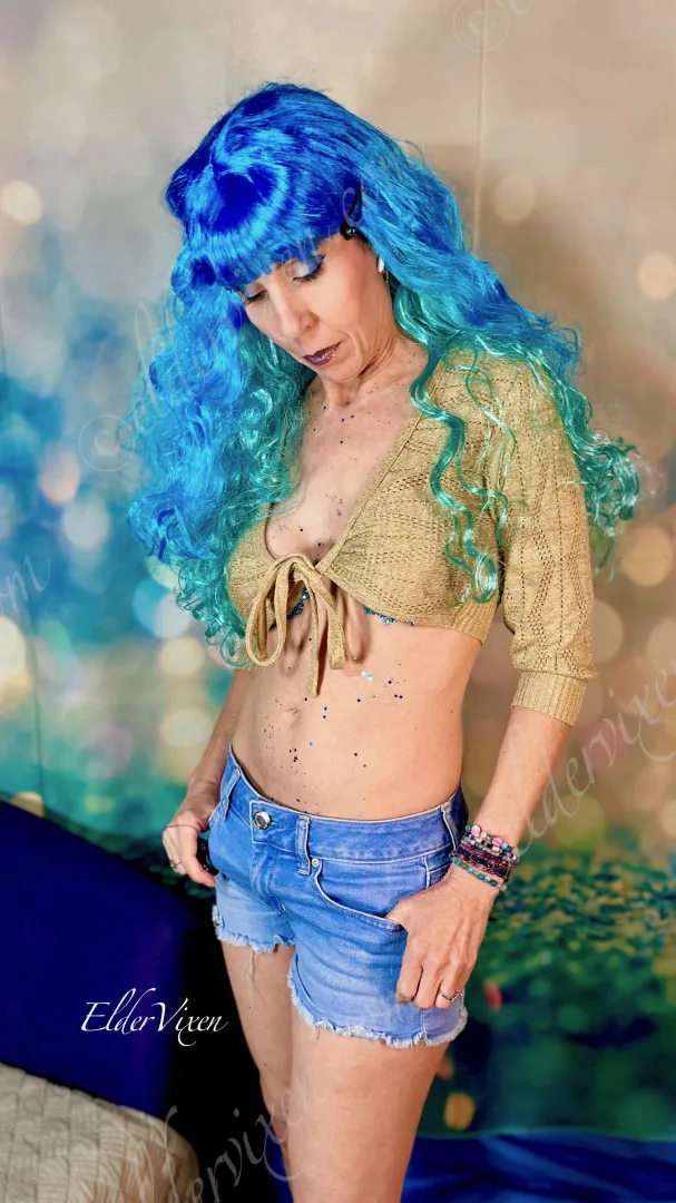 Lowrise blue jean shorts are the way to go...cool and functional