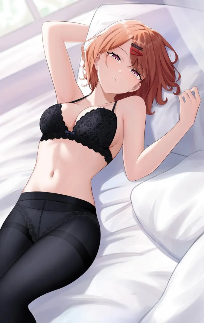 Madoka lying on the bed