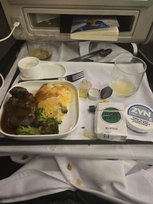 Main Course over the Atlantic. Popped a zyn after dinner. Niccing out for a Lucky