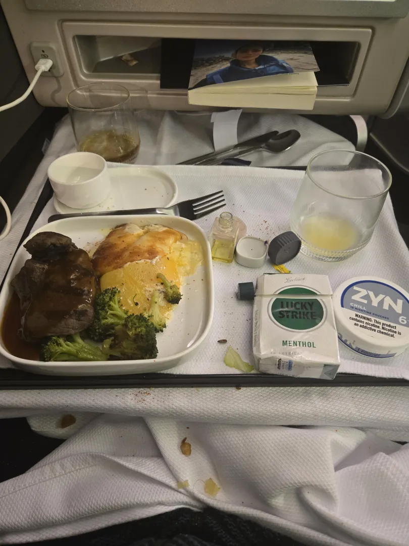 Main Course over the Atlantic. Popped a zyn after dinner. Niccing out for a Lucky