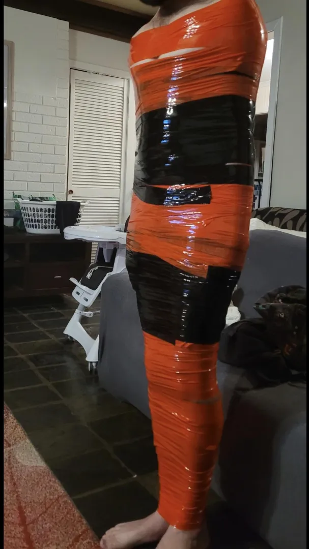 Mummified in pvc tape