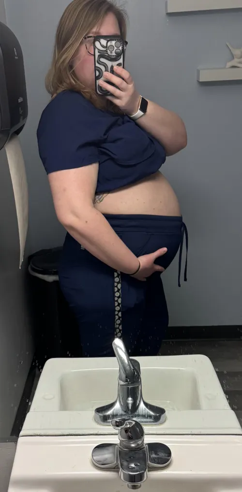 My pregnant belly looks good in scrubs