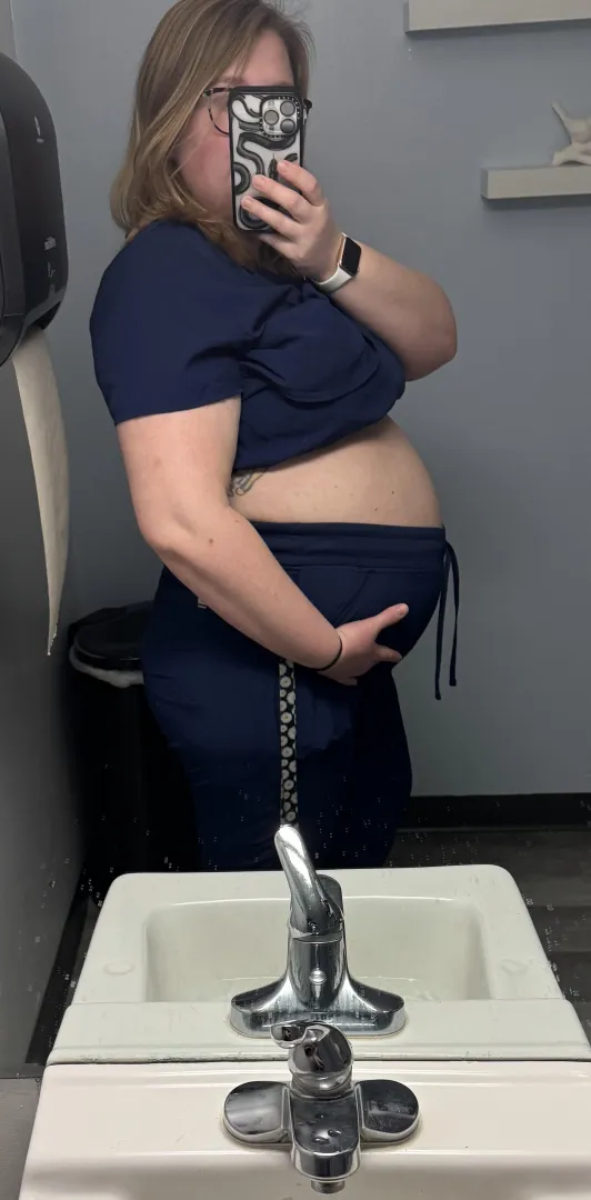 My pregnant belly looks good in scrubs